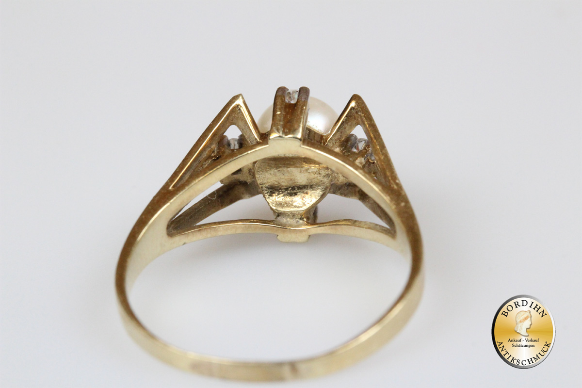 Ring; 14 Karat Gold mit einer Perle und Brillant